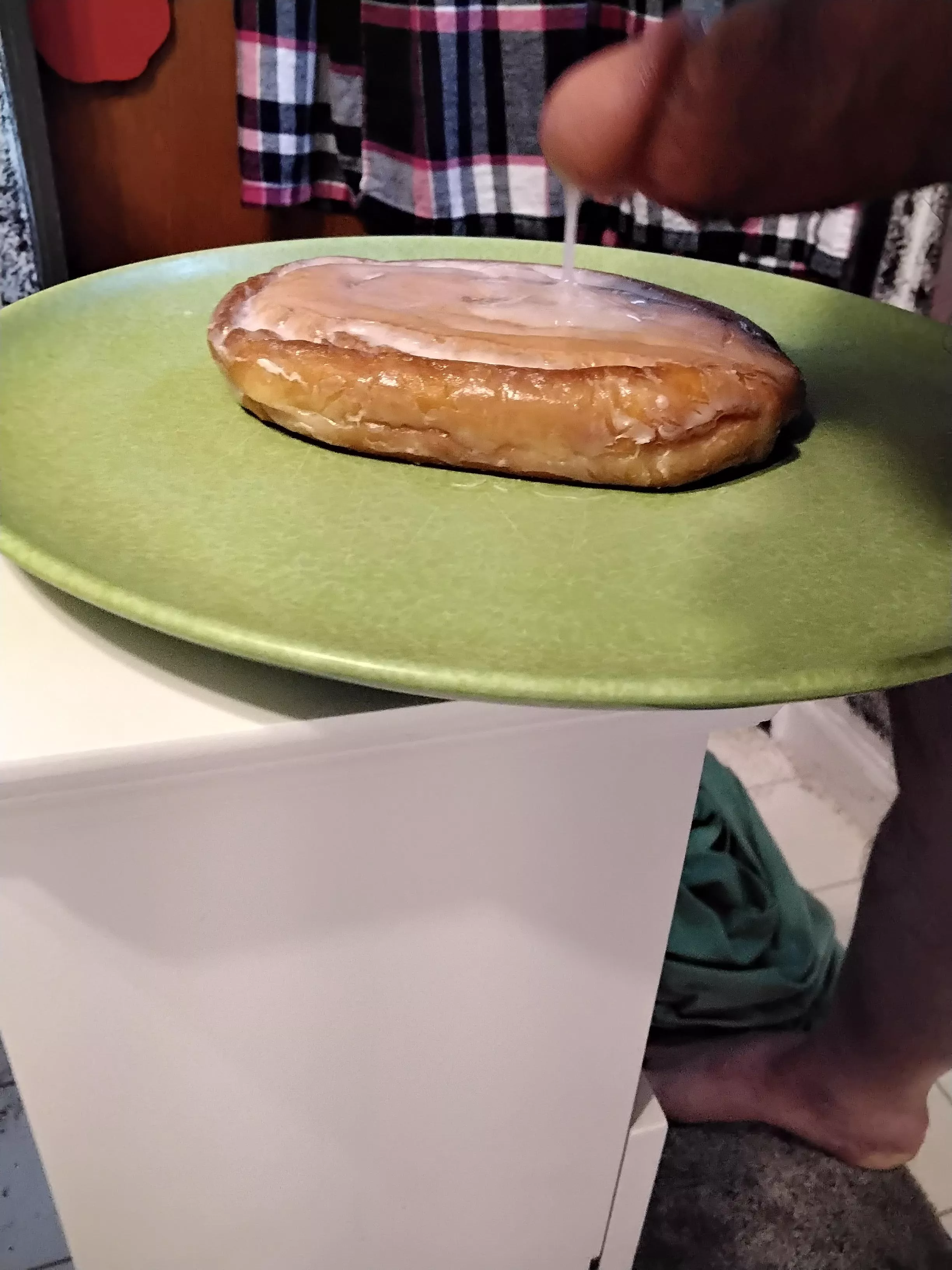 adding some extra icing to my honey bun