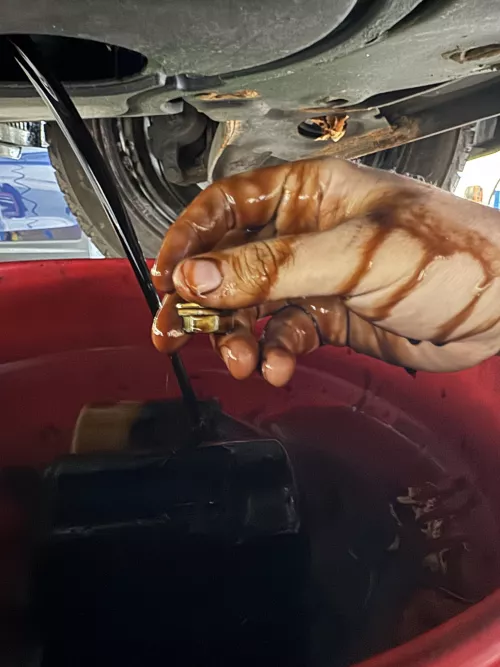 Working hands, almost dropped the drain plug.