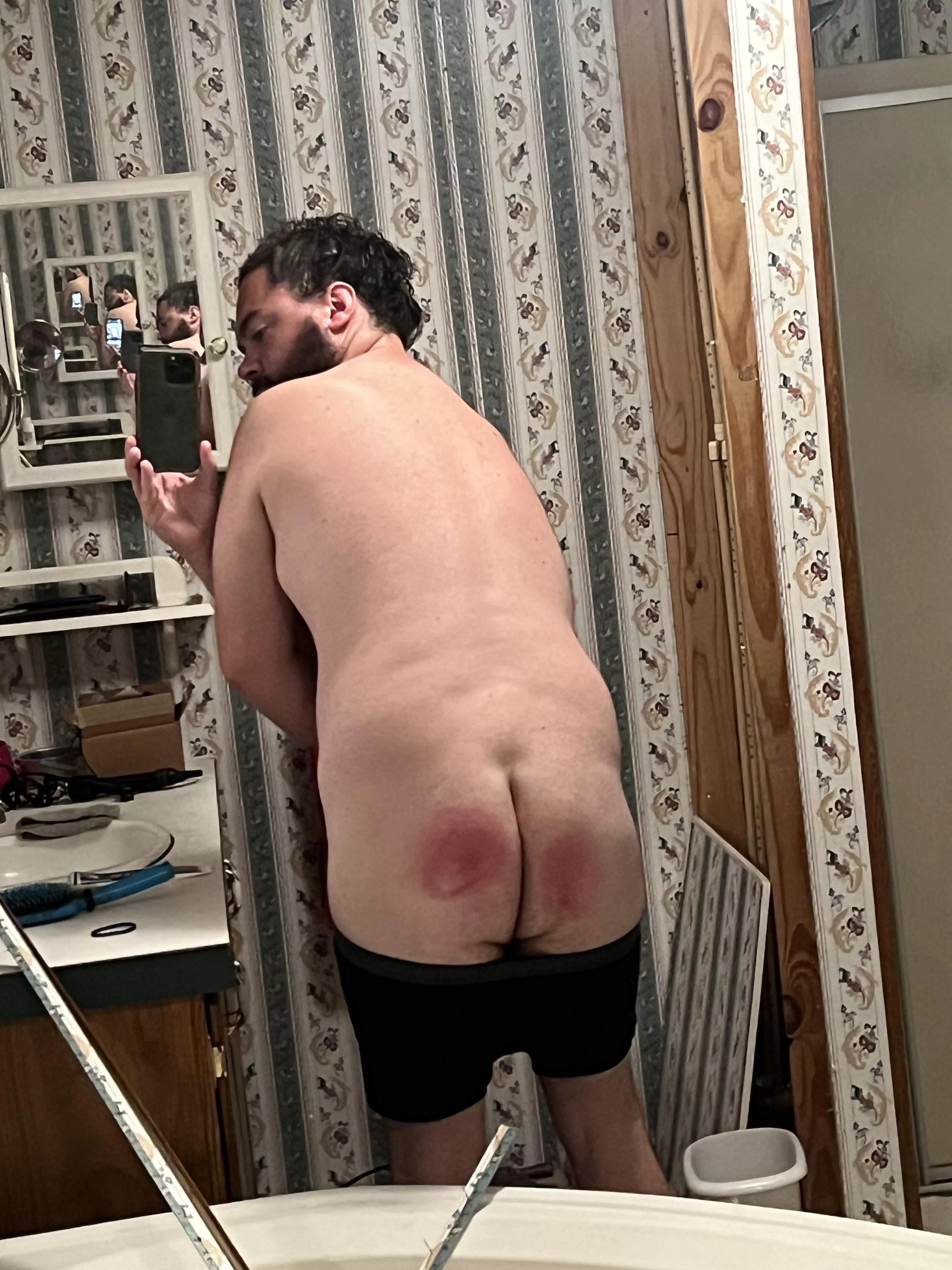 I wasn’t ready to go to work on time so my Mrs gave me ten hard swats with the bath brush. Was it enough??