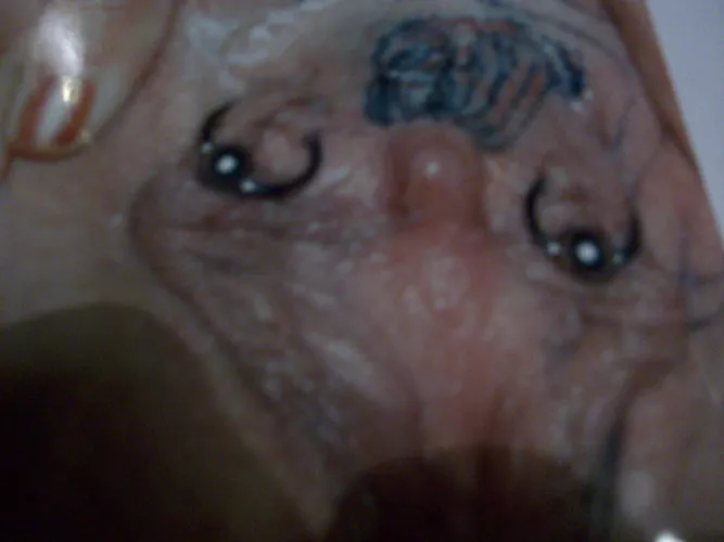 under her hood tattoo