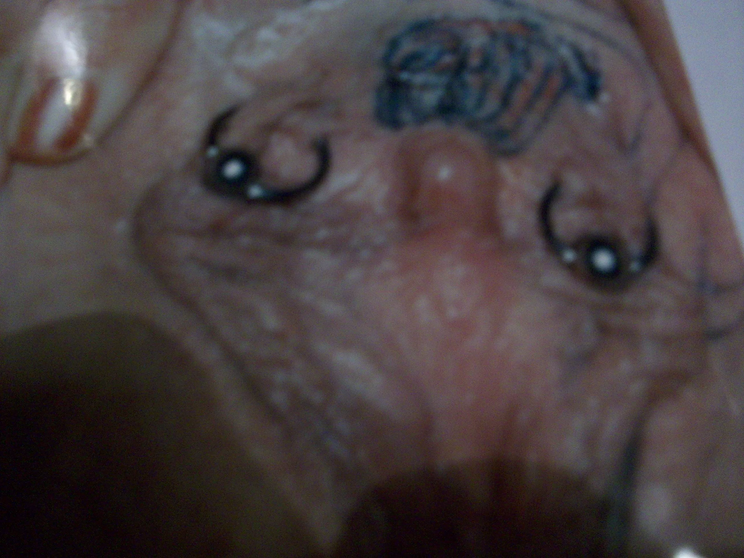 under her hood tattoo