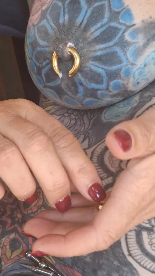 2g (6mm) nipple piercings. When should I stop stretching?