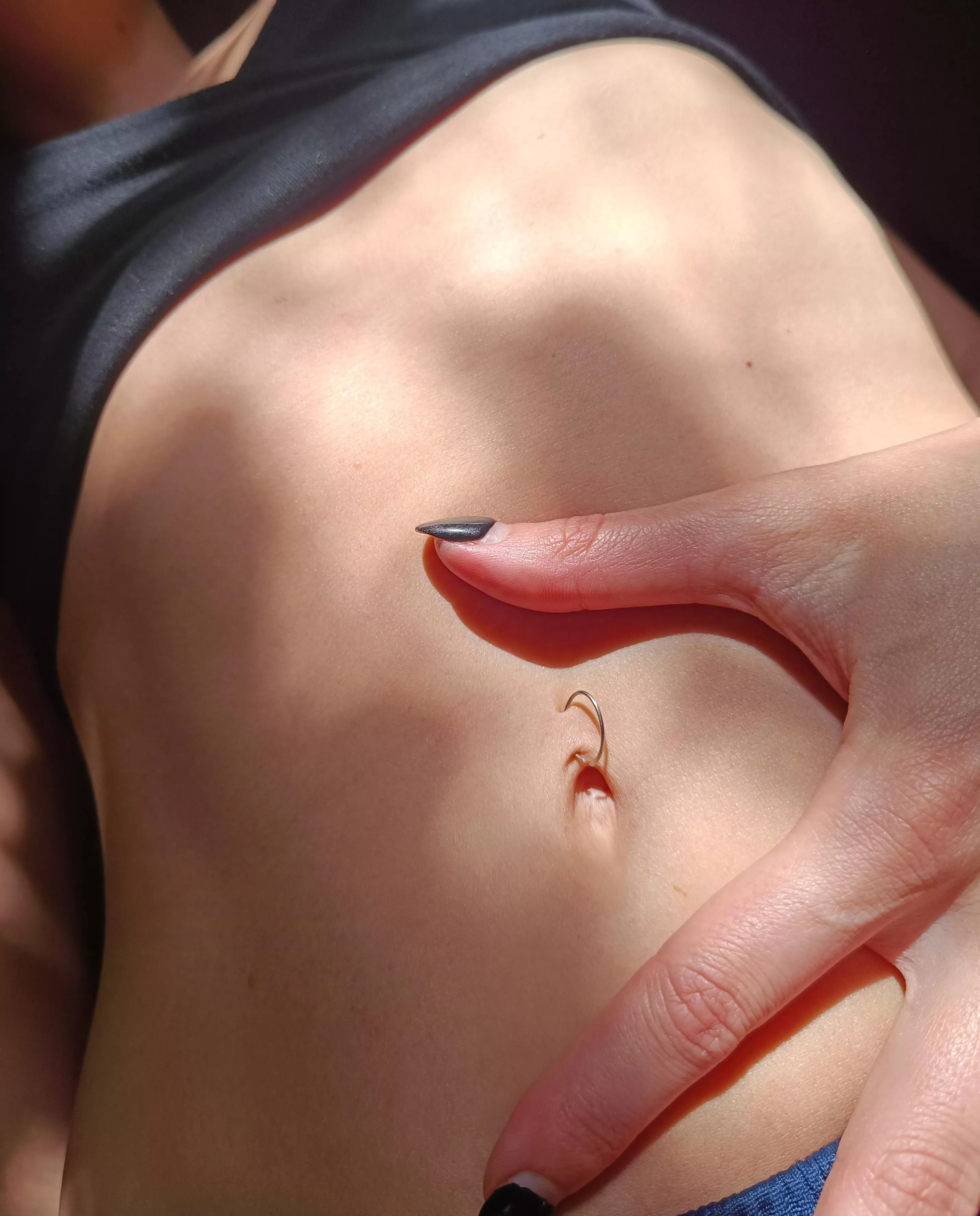 Tell me the truth, you really wanna put your finger inside my belly button, right?