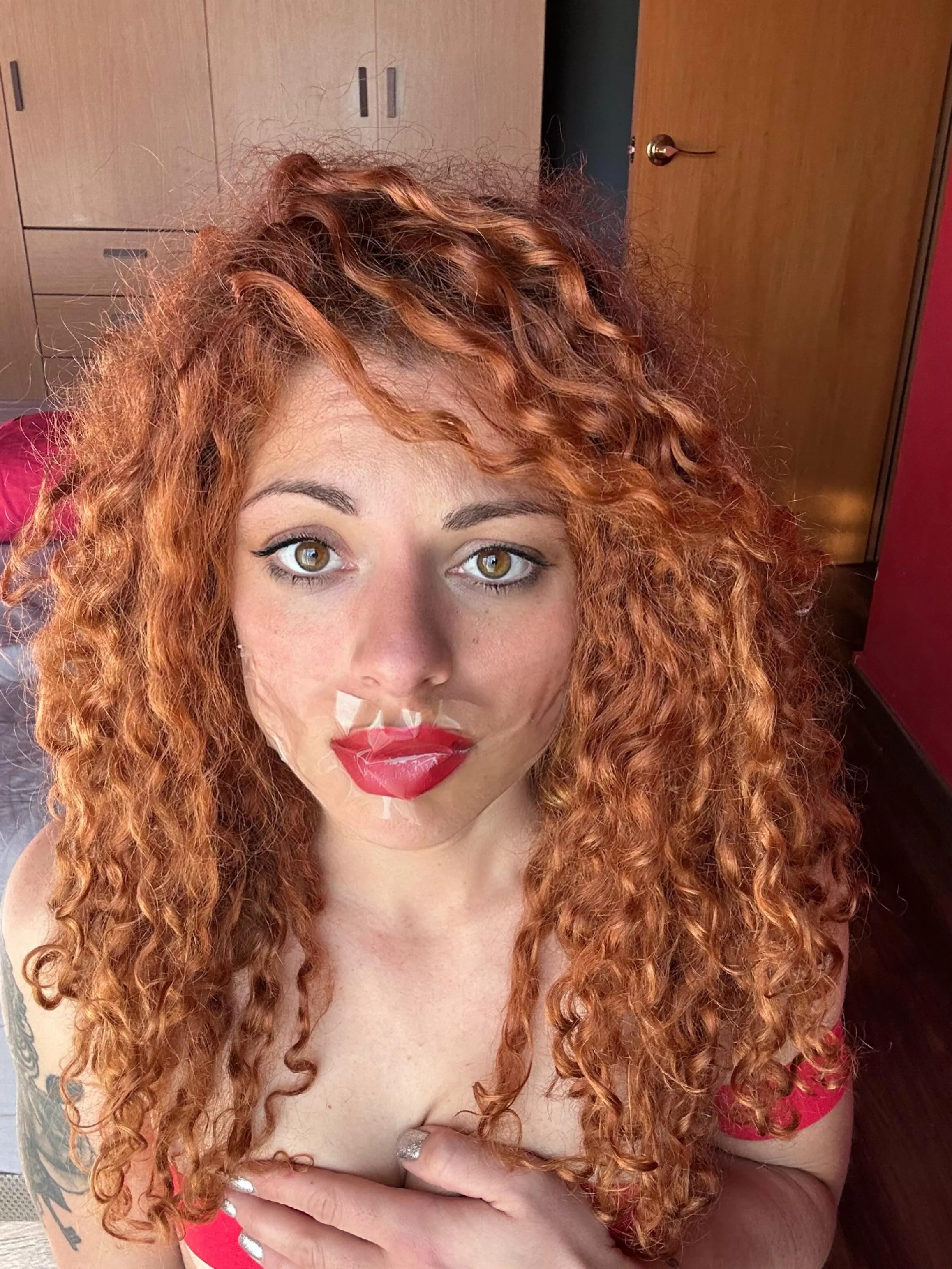 Clear tape over red lipstick