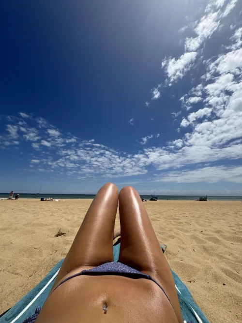 Enjoying the heat of the sun until it fades away.