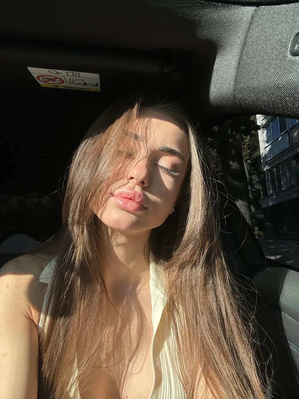 Sunbathing in the car 