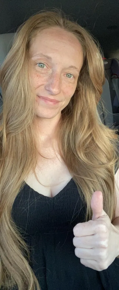 Ginger hair and black dress and green eyes is there anything better?