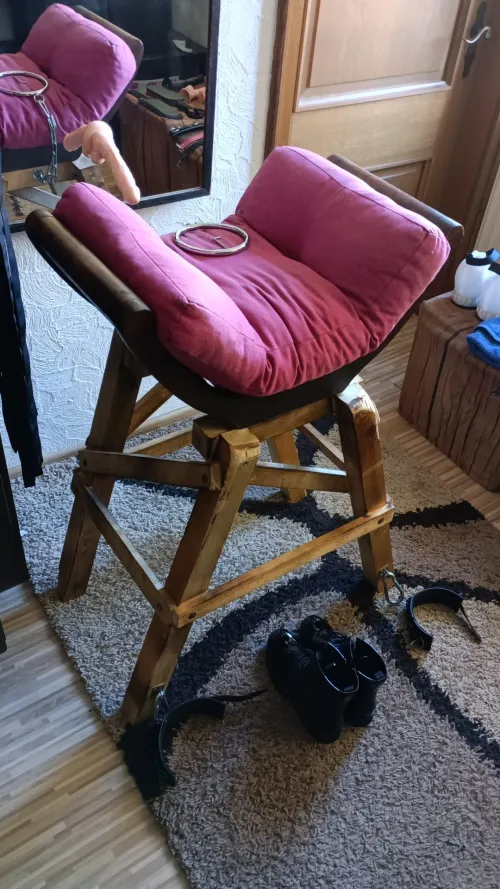 It's soft, cozy, and made from reclaimed wood and an old chair.