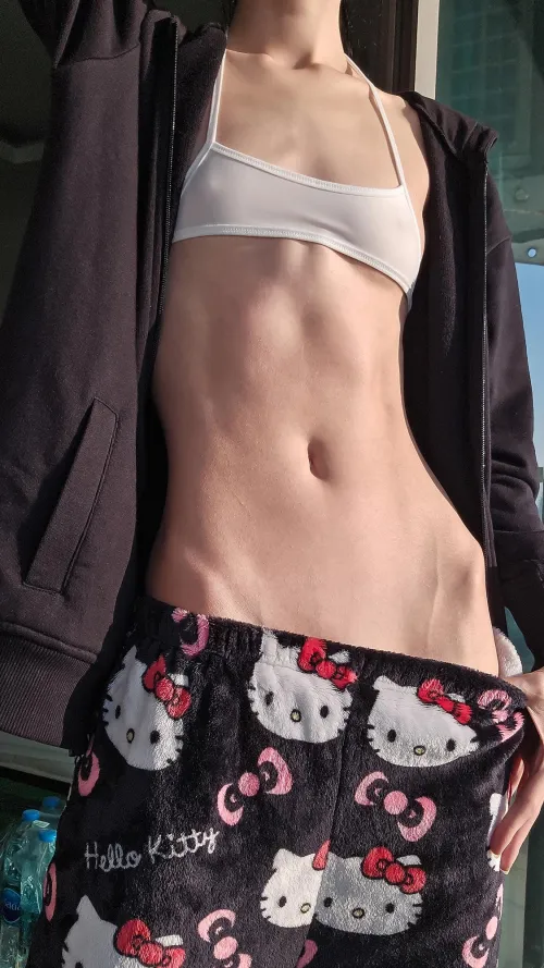 Hipbones in the pre-sunset sunlight