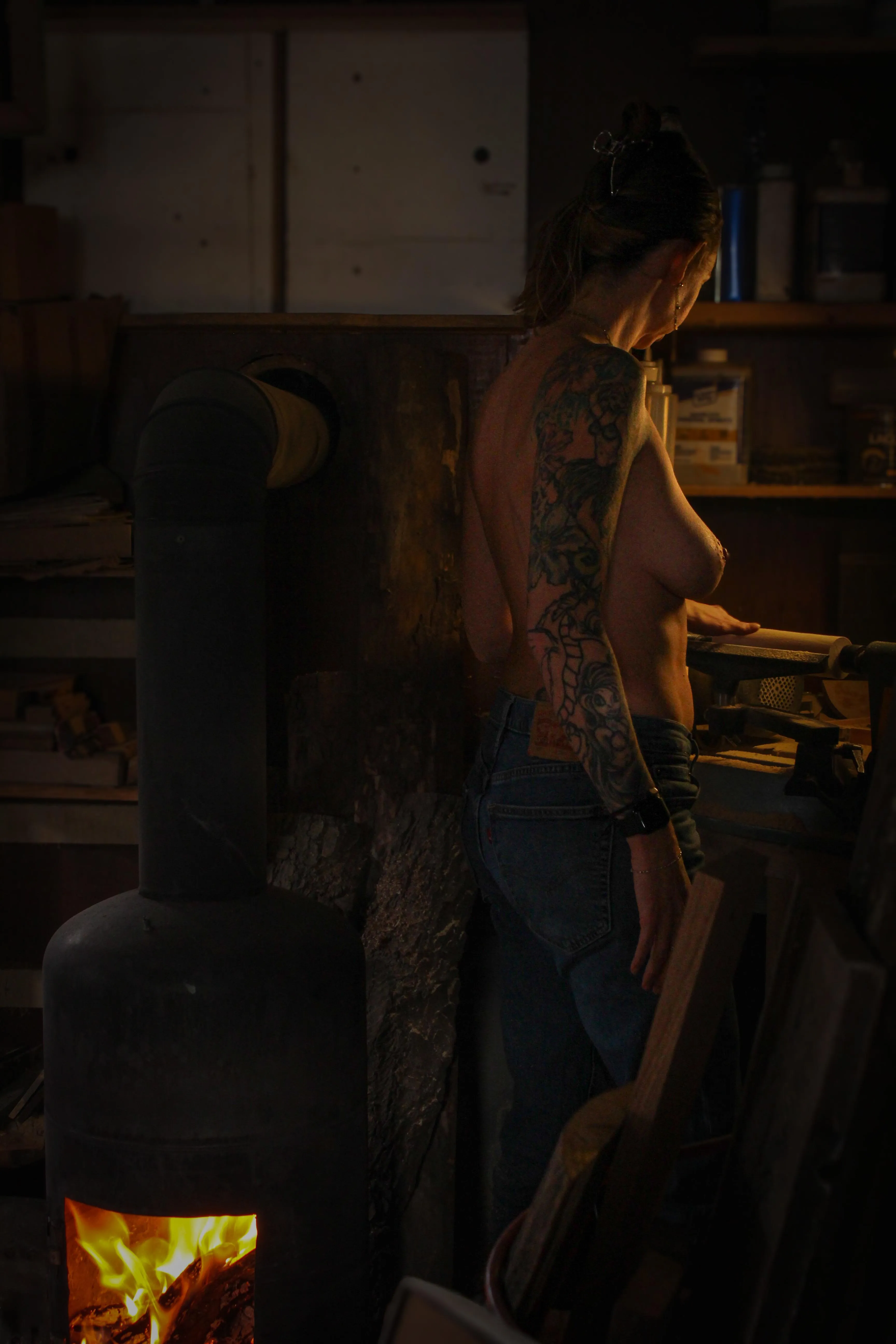 Topless in the wood shop 