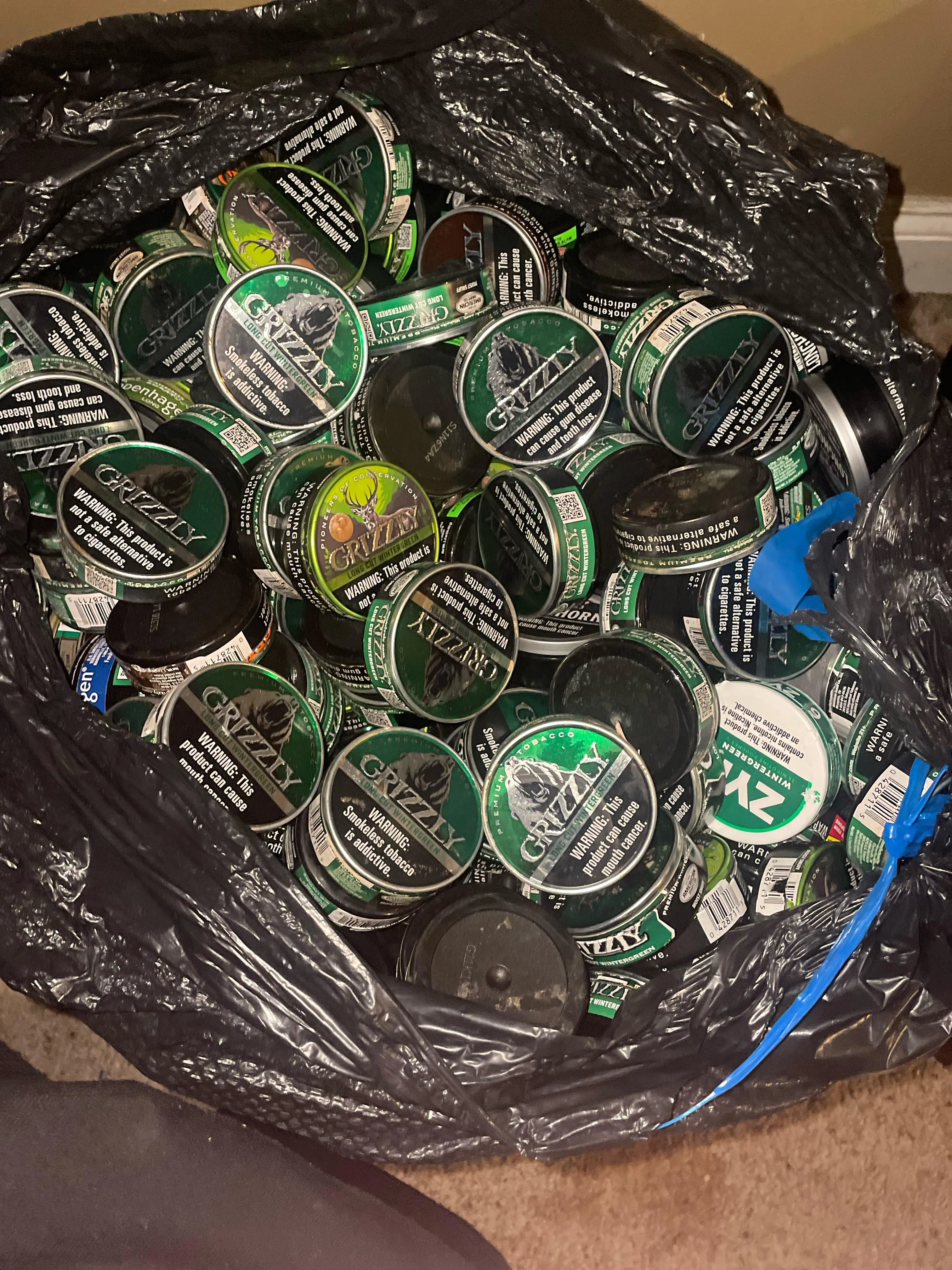 Hefty bag full of cans