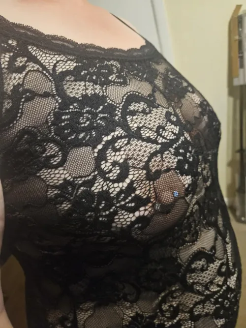 nipple piercings shine through