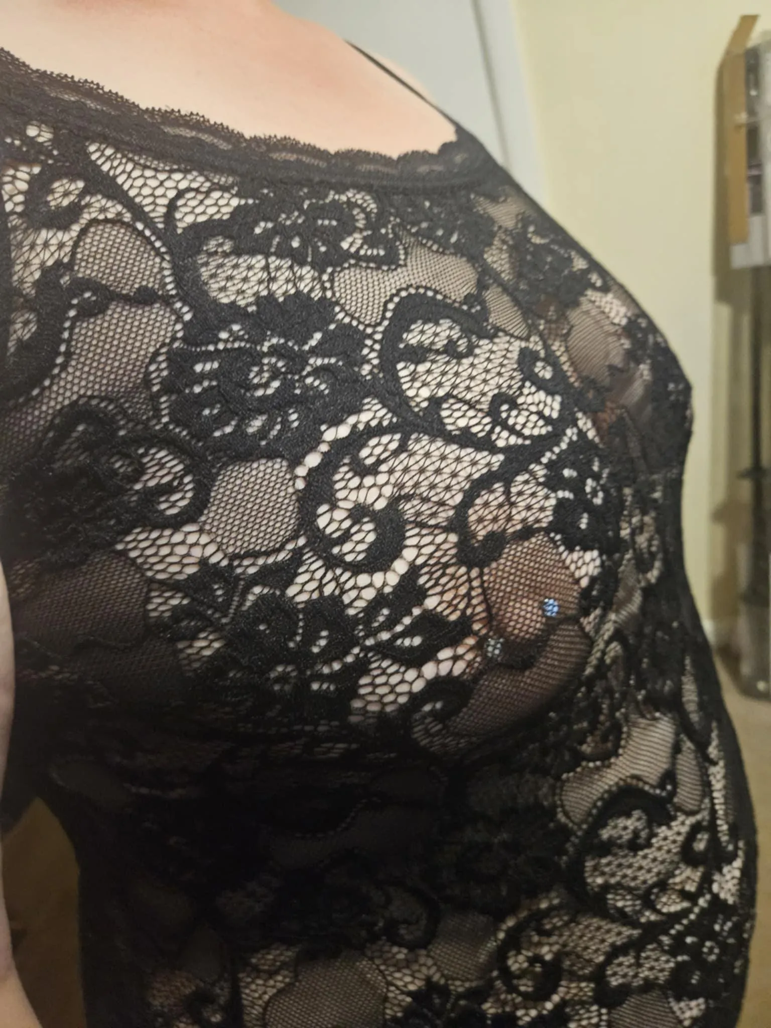 nipple piercings shine through