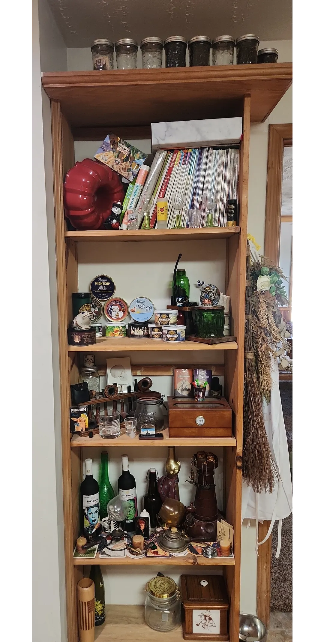 My modest collection interspersed with mine and my wife's souvenir collection.