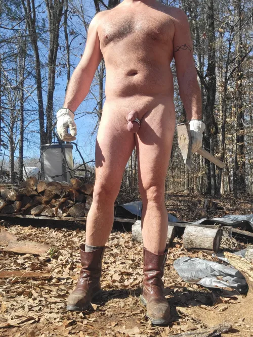 Splitting fire wood naked. What an adventure!