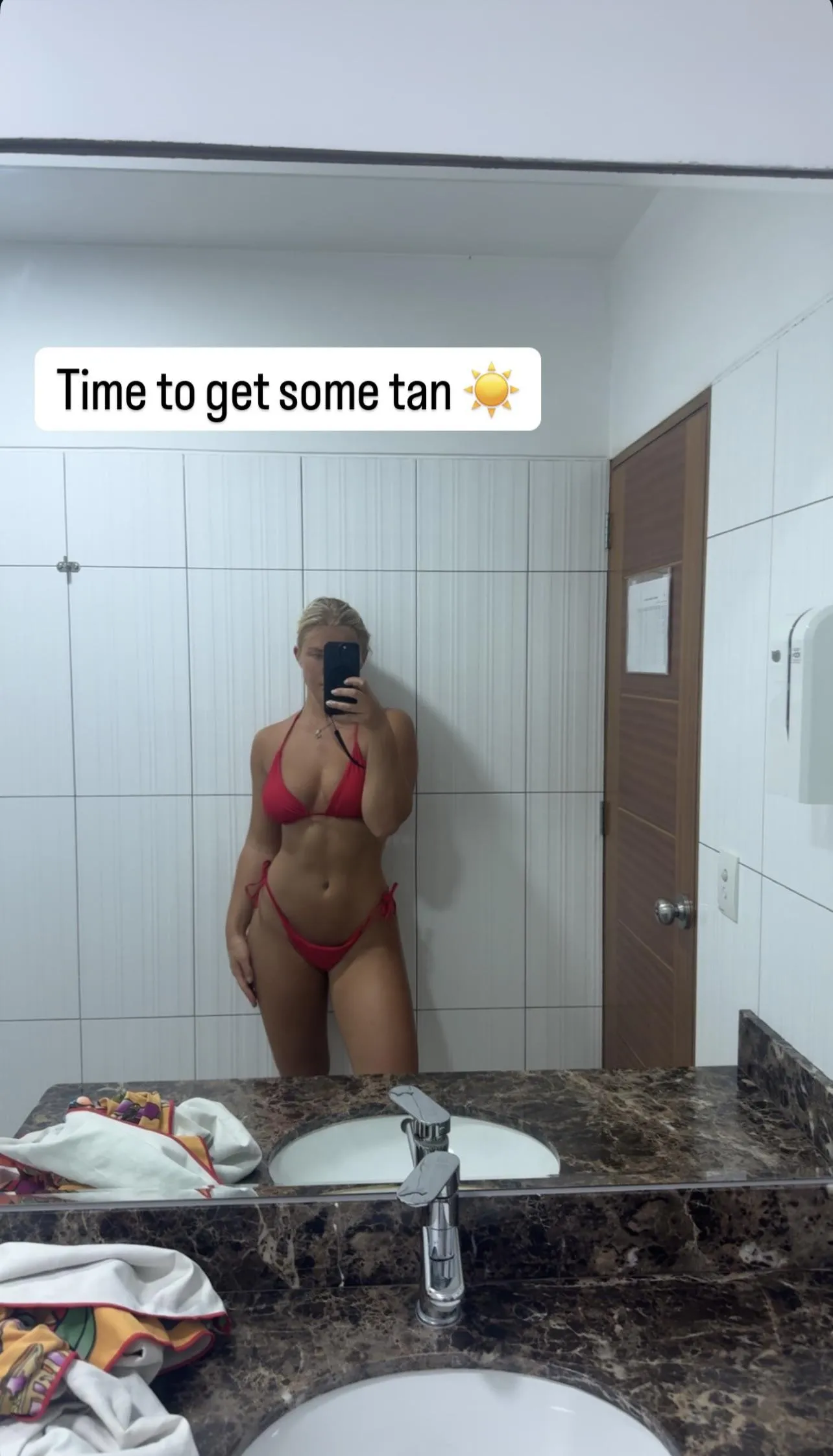 Nikki is getting some tan