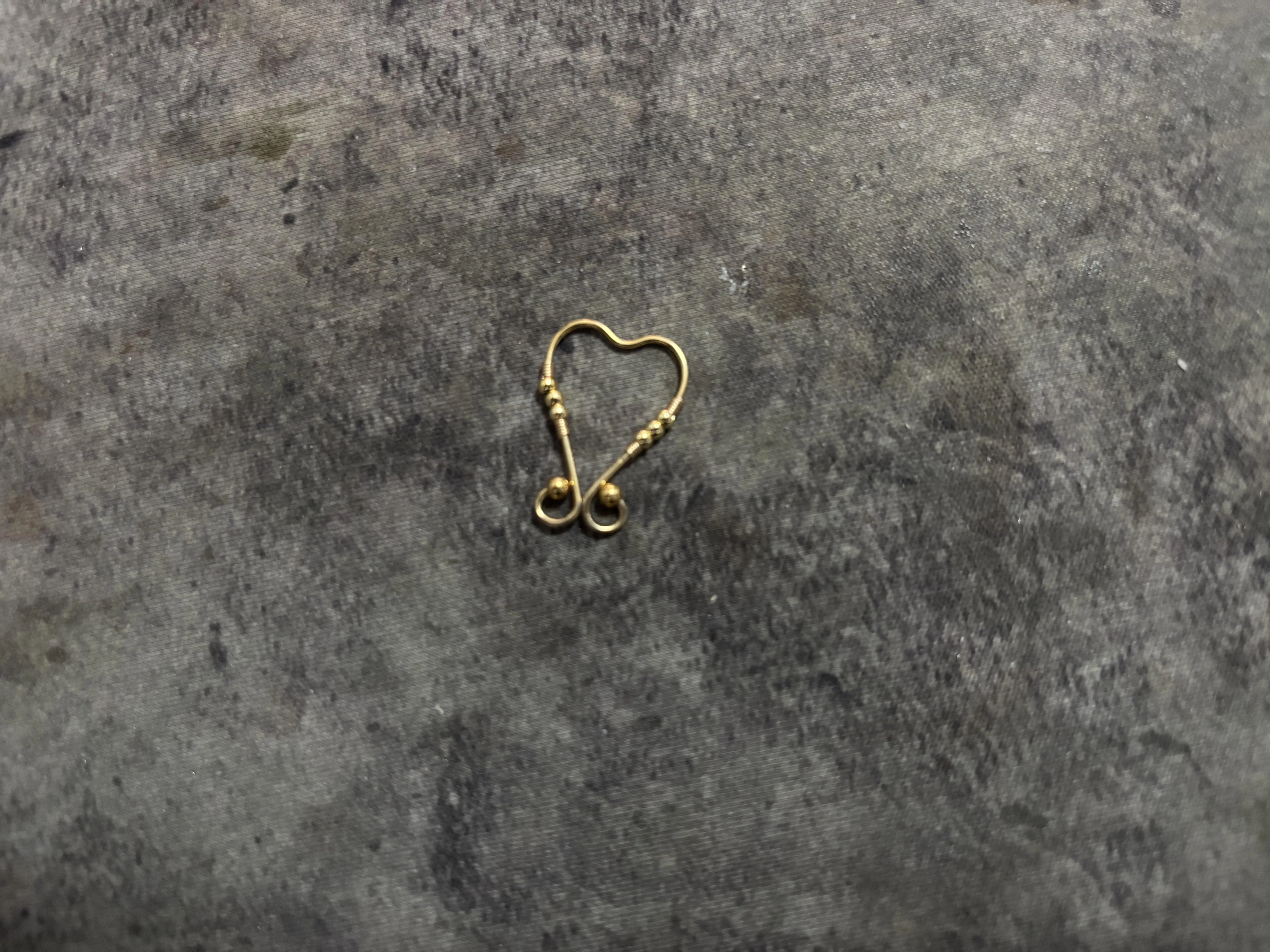 What did I do? Was it pretty? I had no idea how to define it. A clitoral clamp? A nipple clamp? Something else?