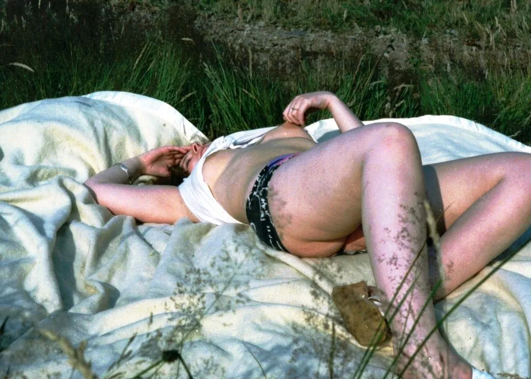 1988 21, one of her first poses for me, near a public footpath, little tug on her nipple, still my GF before becoming my wife. 34B's back then.