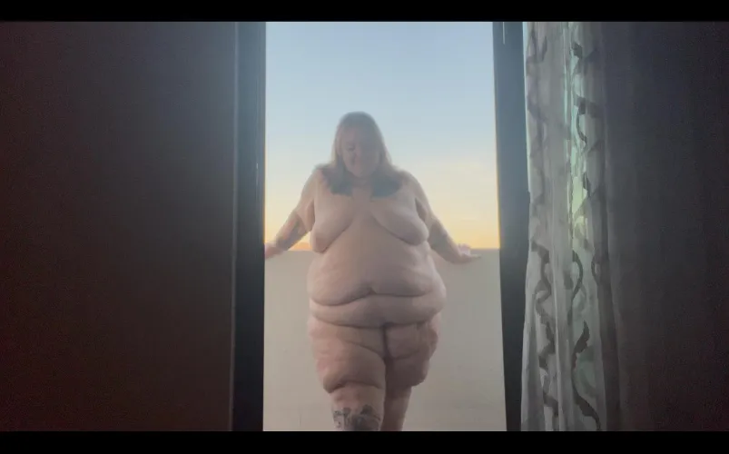 Just hanging out on my hotel room balcony, enjoying the warm breeze.