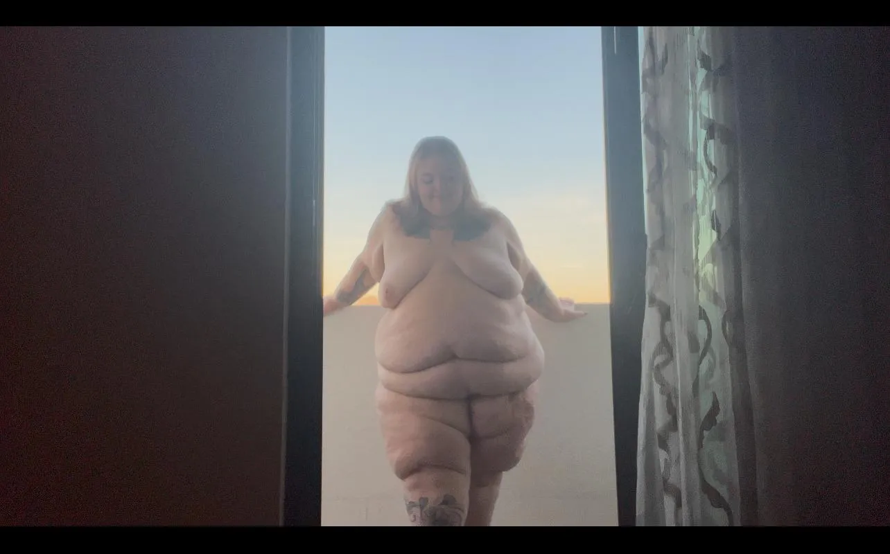 Just hanging out on my hotel room balcony, enjoying the warm breeze.