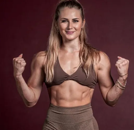 Who loves female muscle combined with femininity?