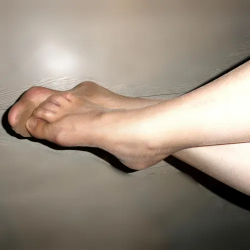My feet in very sheer pantyhose