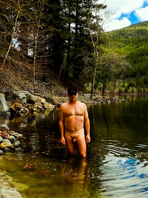 a cold dip, the good thing about getting old is i don't care what i look like and the fat helps me endure (and enjoy the cold). a photo from early last Spring in a cold mountain lake