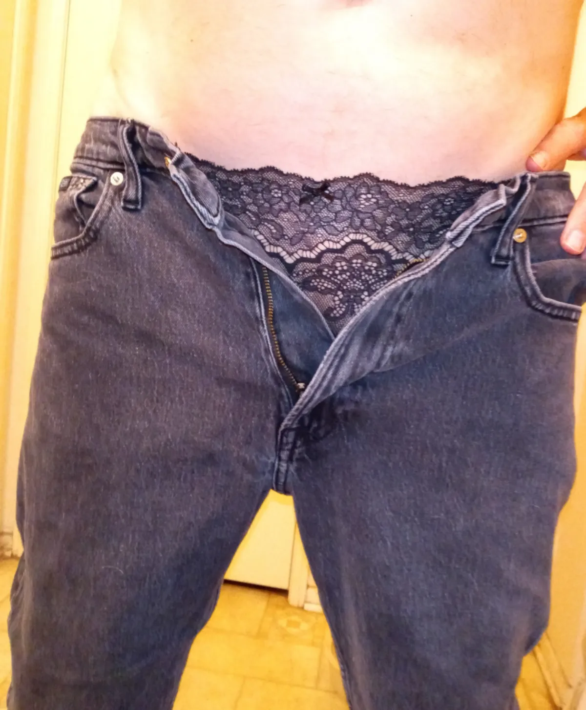 Faded jeans and black lace