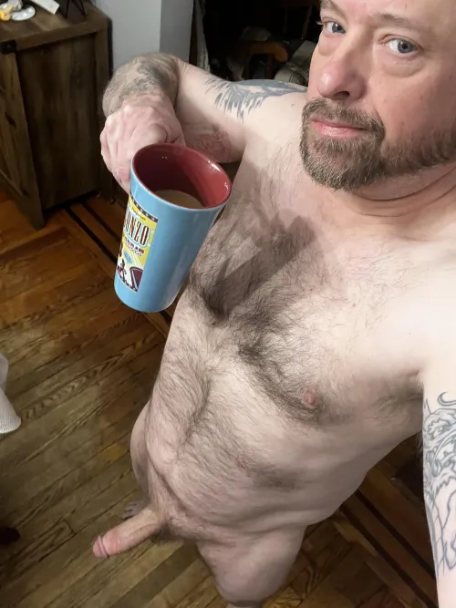 Hot cup of coffee in the nude. [48]