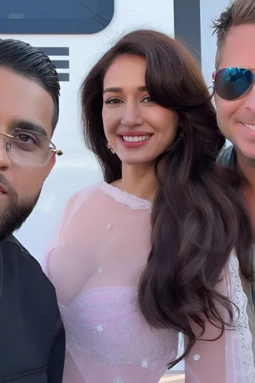 Disha patani yummy 🥭 s hope those two guys gotta taste one of them for each