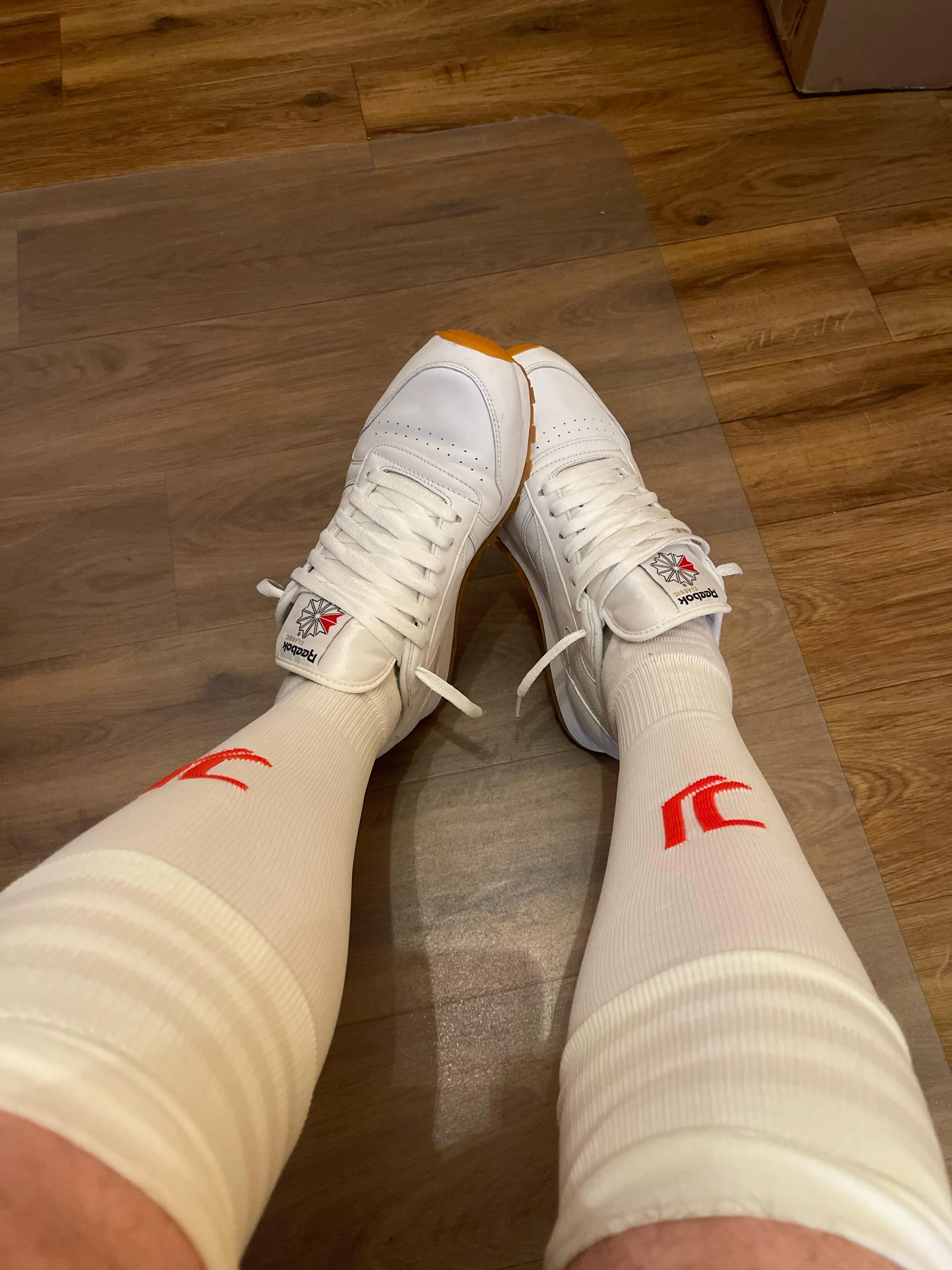 Footie socks and reeboks.