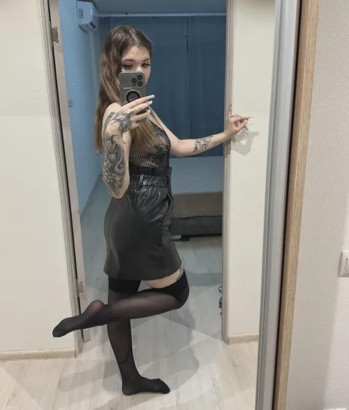 black stockings with a black outfit is a good combination