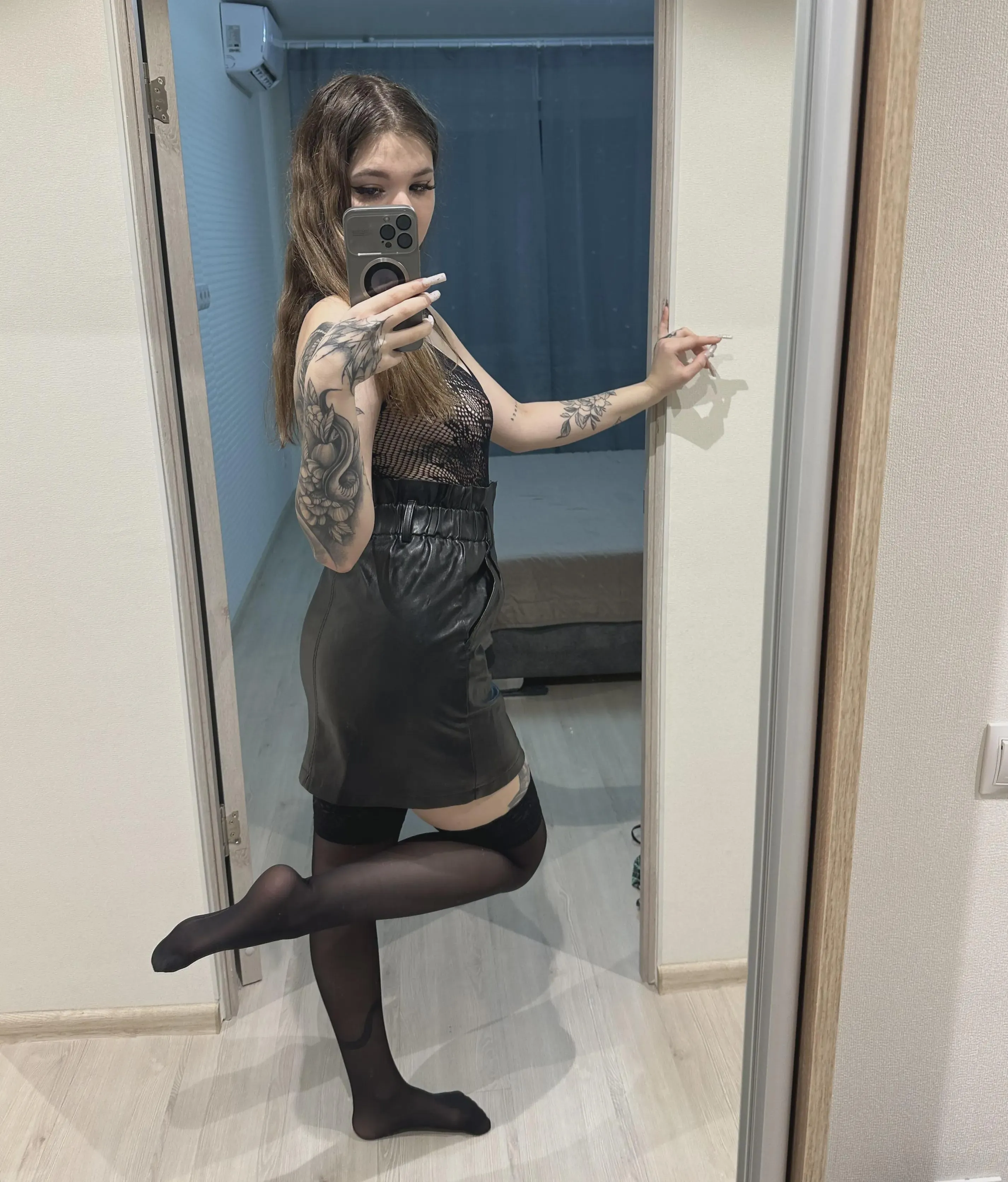 black stockings with a black outfit is a good combination