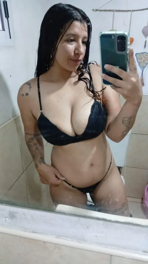 Busty Latina in black lingerie