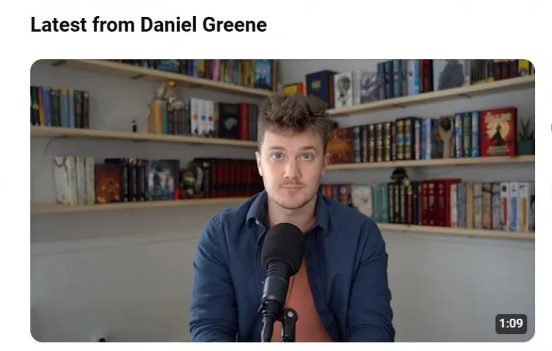 A Youtube apology the way it's MEANT to be done - in front of a shelf of Sanderson books