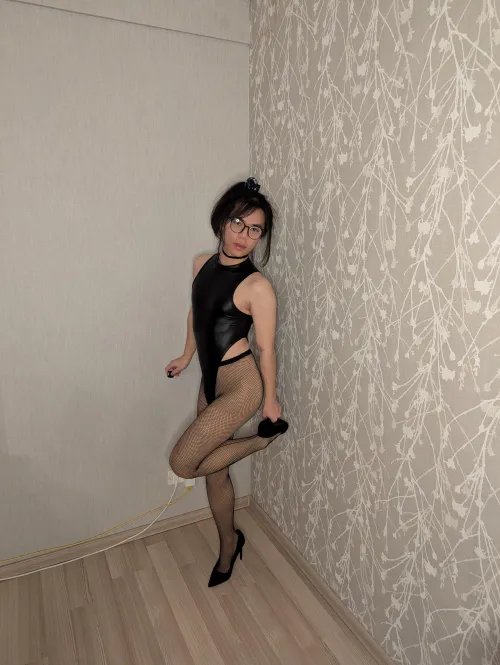 High cut bodysuit and fishnets, what do you think? 🖤