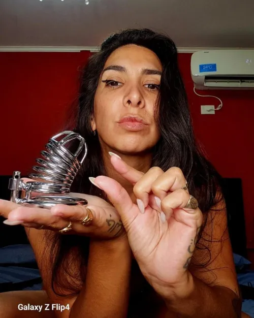 Should I put your little cock in the cage because it's useless?