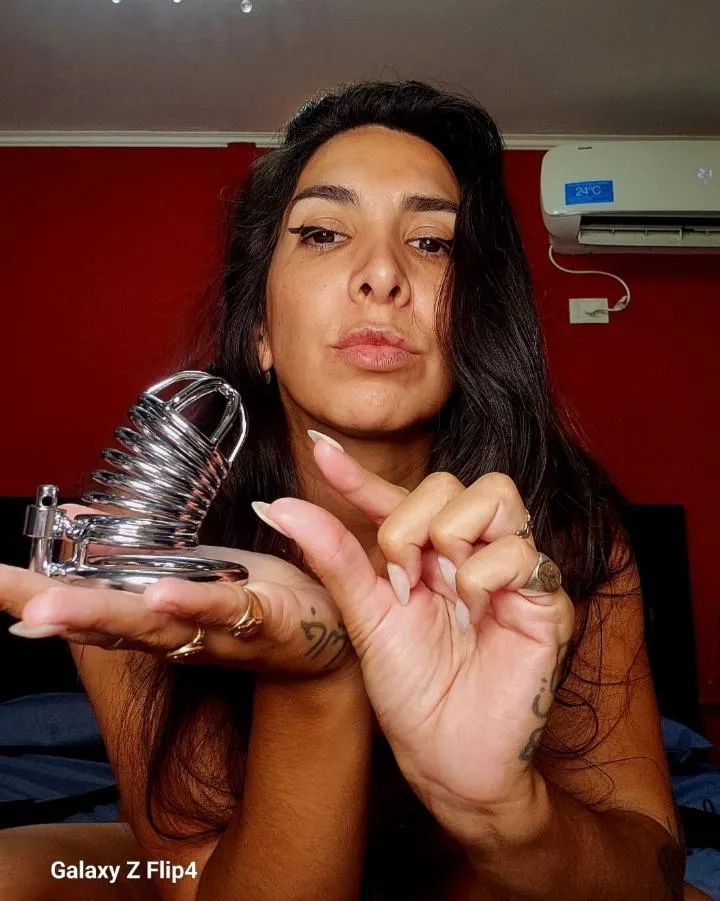 Should I put your little cock in the cage because it's useless?