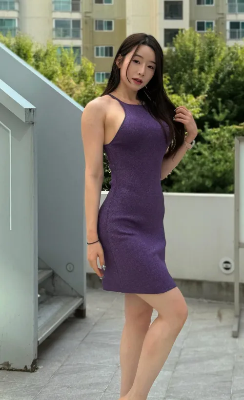 An angel’s poise with a touch of fire.