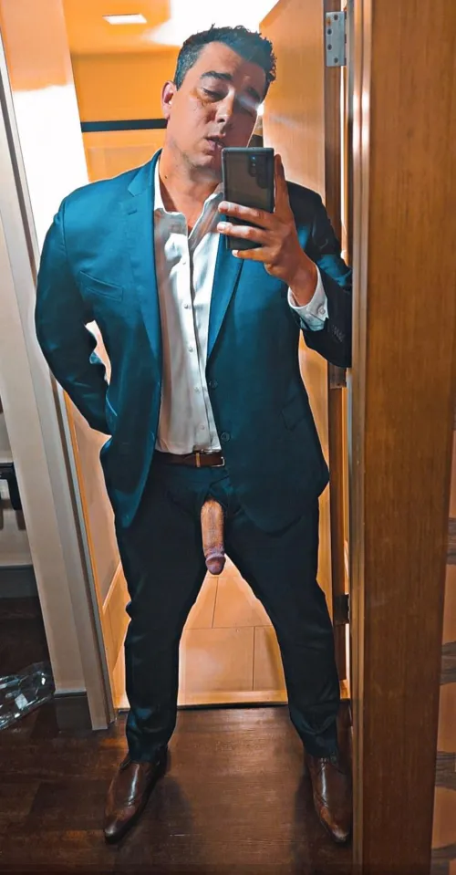 I can't help myself when I put a suit on