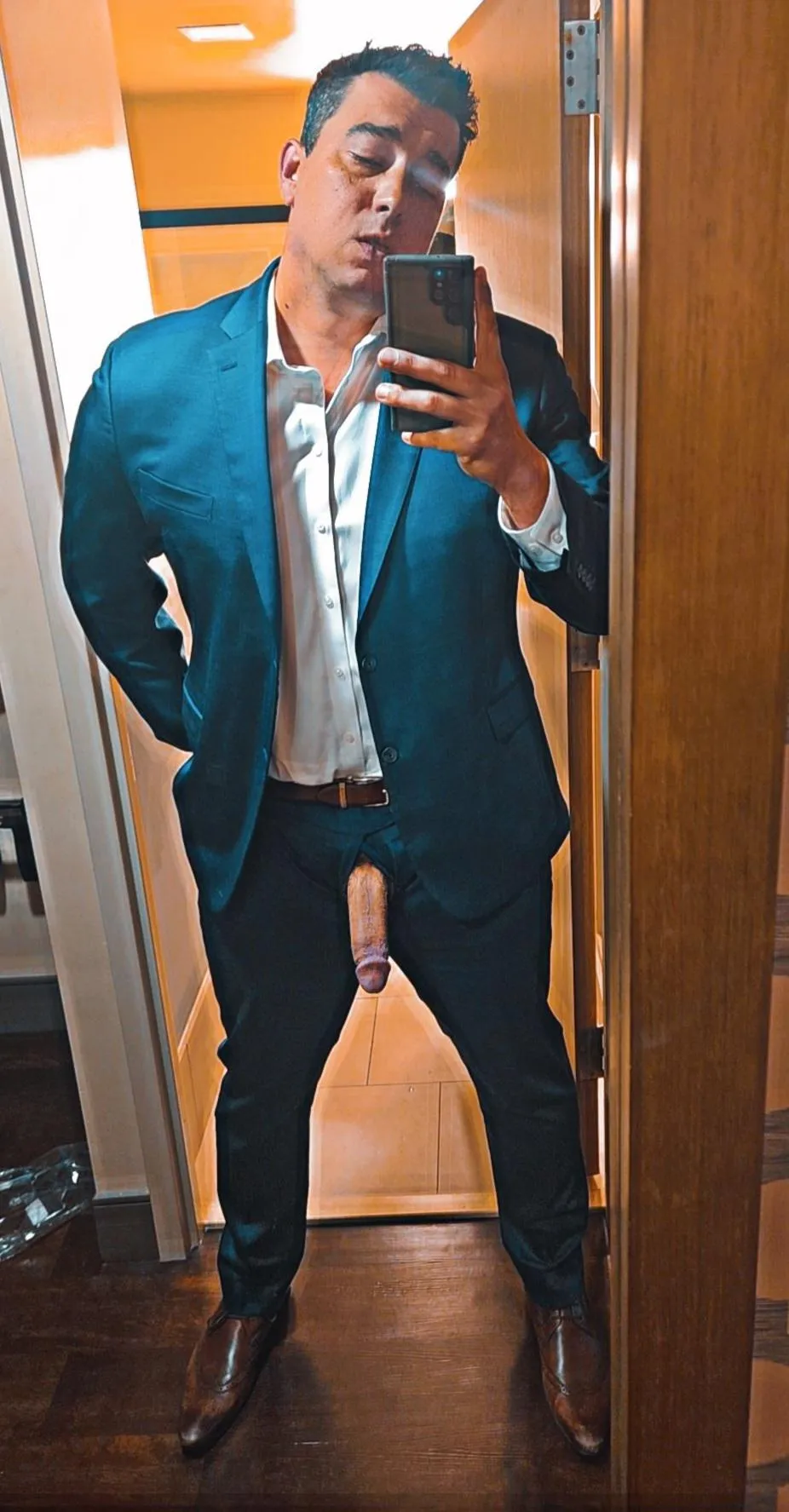 I can't help myself when I put a suit on