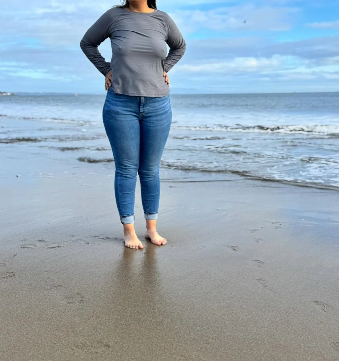 My mommy tits in full swing on the beach.