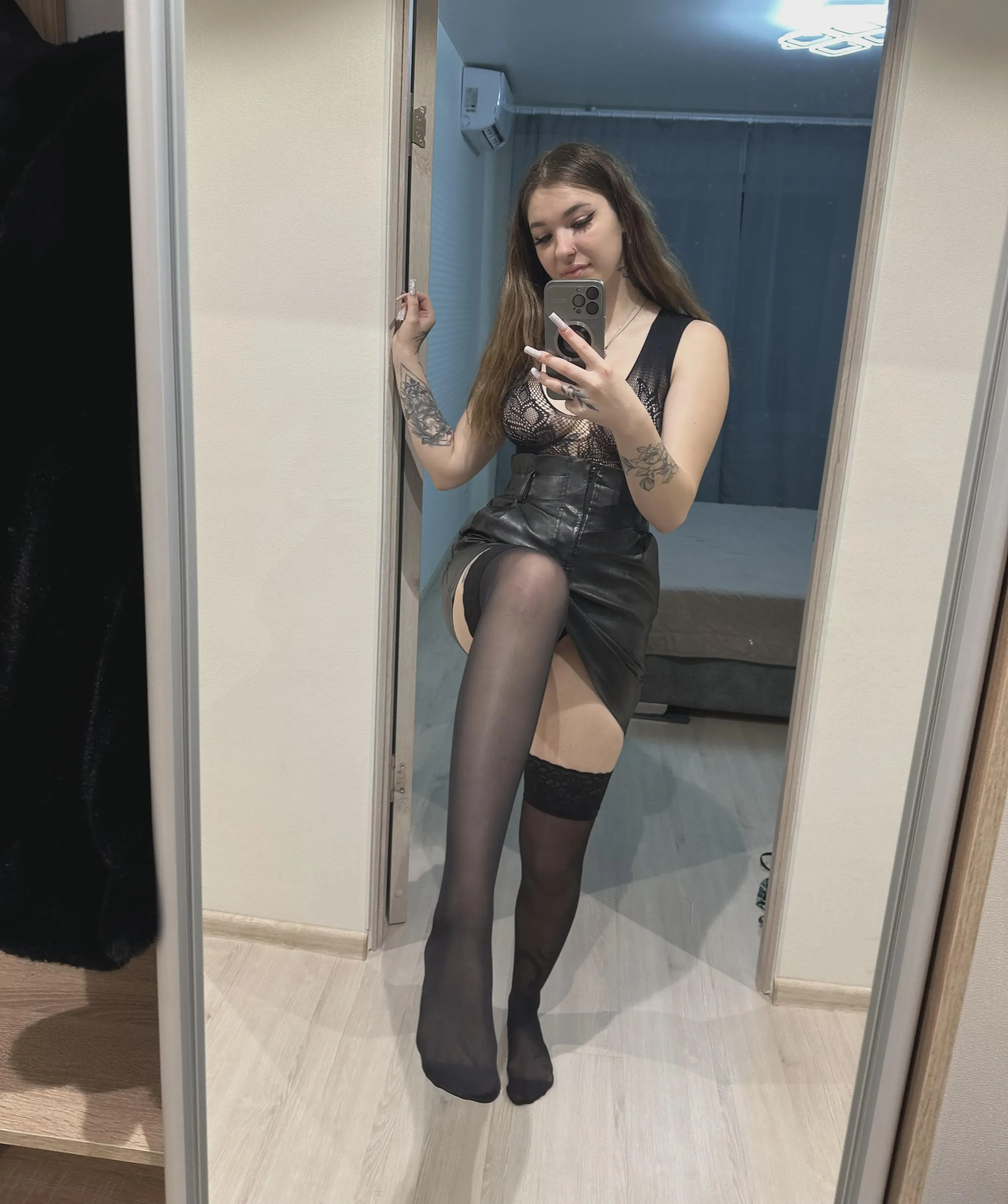 The leather skirt looks good on me