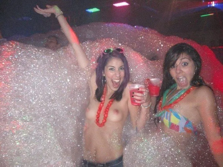 Topless at a foam party