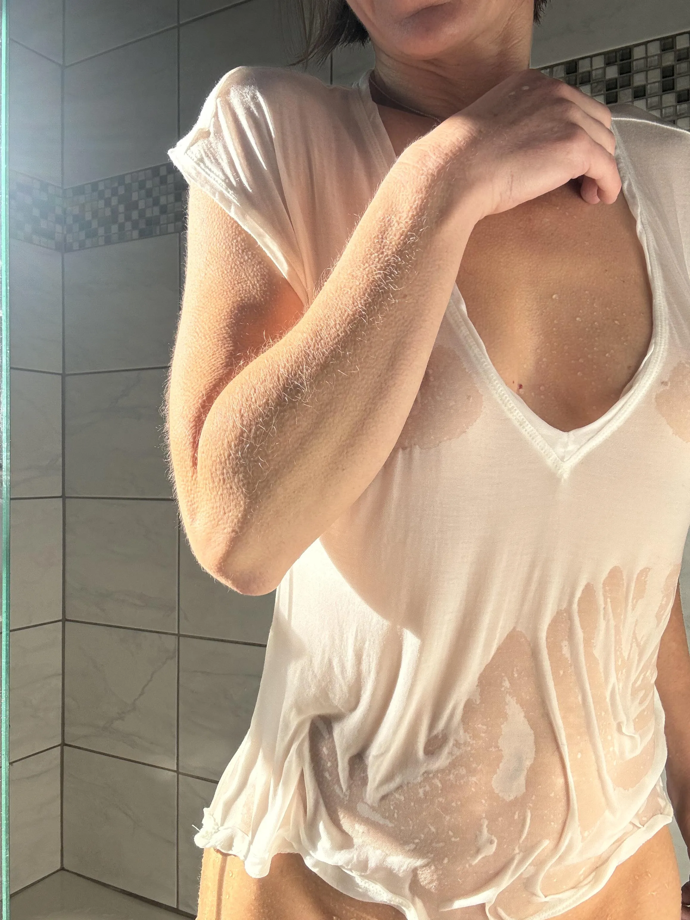 Arm goosebumps in the sun