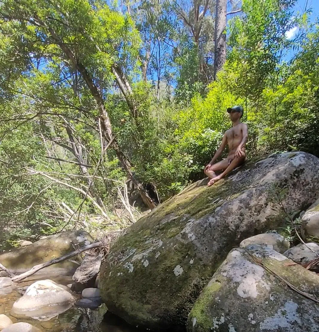 Enjoying nature perched on a boulder