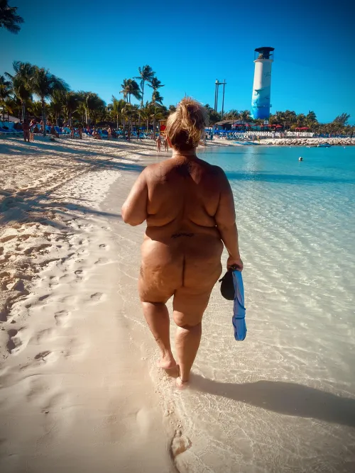 Strolling the beach at Great Stirrup Cay (Bahamas).
