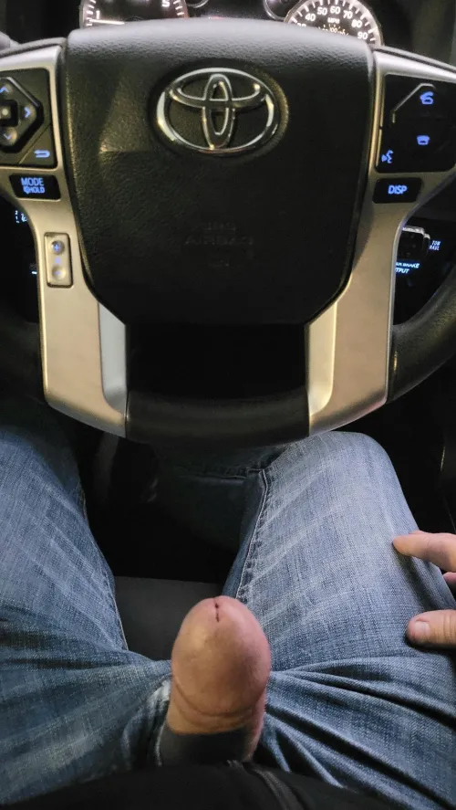 Pizza joint parking lot waiting on my pie