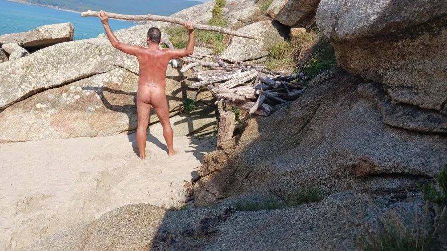 Sunbath and collecting the wood brought by the sea to make a cabin