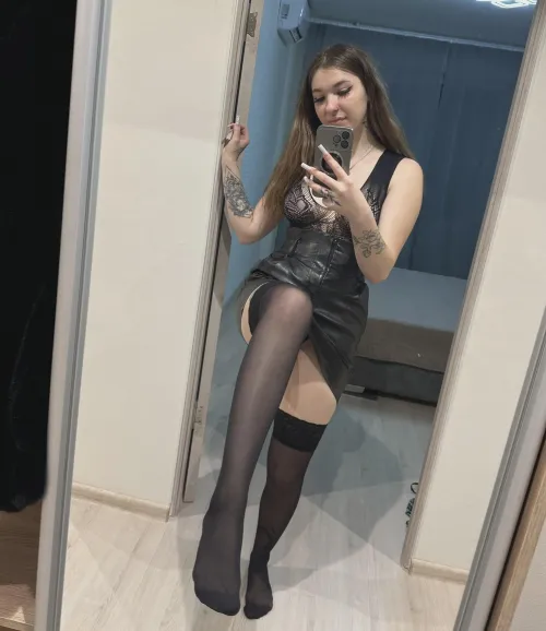 The leather skirt looks good on me